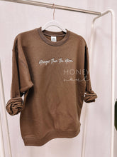 Load image into Gallery viewer, Embroidered Stronger Than The Storm Sweatshirt