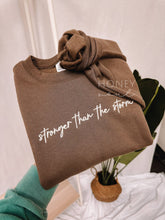 Load image into Gallery viewer, Embroidered Stronger Than The Storm Sweatshirt